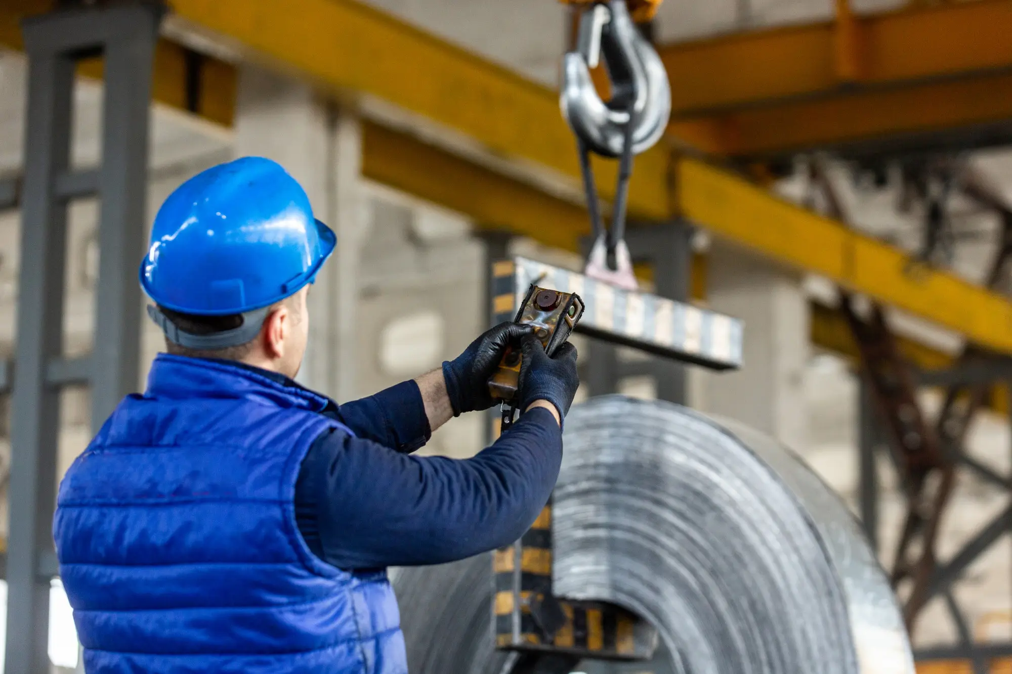 a worker while maintaining the overhead crane