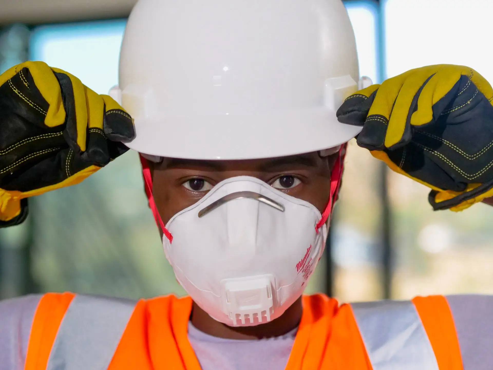 Employee wearing the PPE to work with the Lead